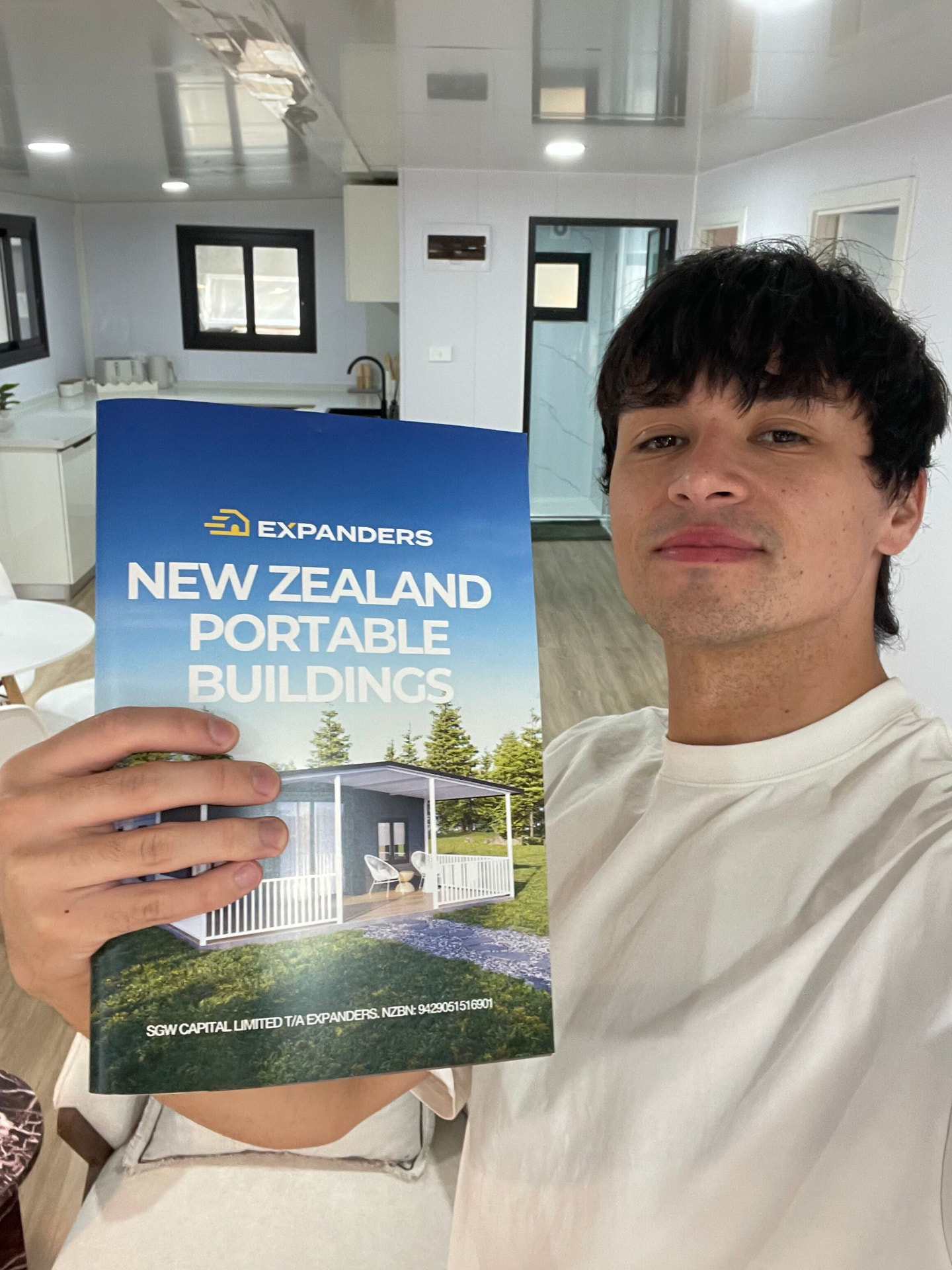 Expanders® brochure held inside a portable building